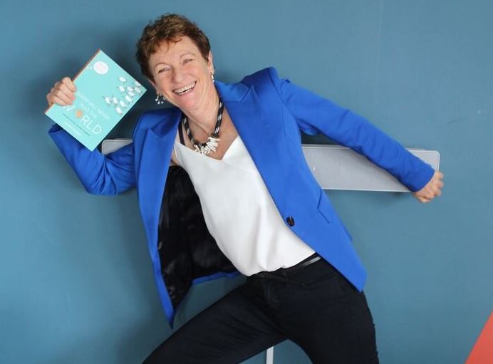 Fetola CEO Catherine Wijnberg holding her book "Sheep Will Never Rule The World" which is about business tips and how to live your life to the full.