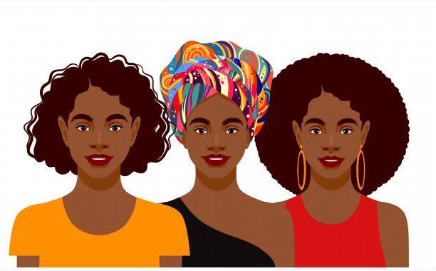 Three women of color showing that they proud of their hair which is a reflection of their heritage.